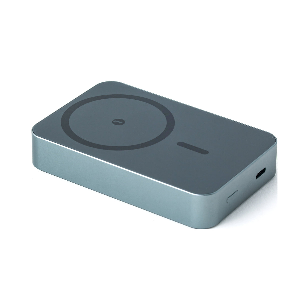 Silver Tekne wireless charging pad with circular charging zone and USB-C port