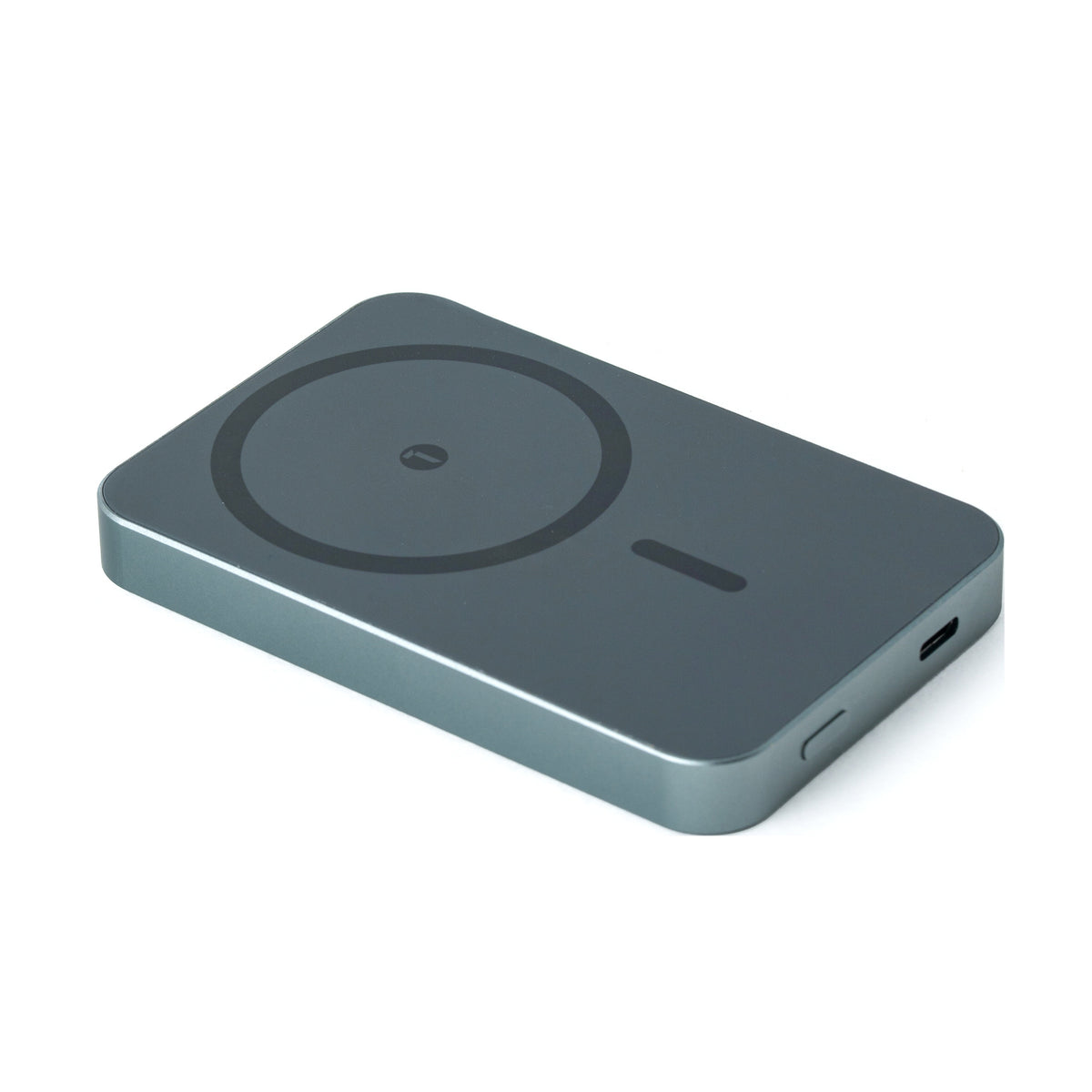 Dark Tekne grey wireless charging pad with circular charging zone and USB-C port
